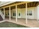 Spacious patio with stamped concrete and access from the stairs at 249 Chadwyck Ln, Canton, GA 30115