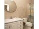 Bathroom with tiled walls, vanity, toilet and shower at 249 Chadwyck Ln, Canton, GA 30115