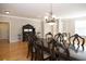 Bright dining room with hardwood floors and chandelier at 249 Chadwyck Ln, Canton, GA 30115