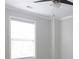 Simple bedroom with neutral walls, ceiling fan and window at 249 Chadwyck Ln, Canton, GA 30115