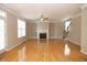 Spacious living room with hardwood floors and fireplace at 249 Chadwyck Ln, Canton, GA 30115