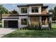 Modern two story home with wood and gray exterior at 4825 Neal Rdg, Atlanta, GA 30349