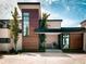 Modern home with wood and stone exterior at 4837 Neal Rdg, Atlanta, GA 30349