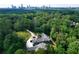 Luxury home nestled in a wooded area with city skyline views at 2883 W Roxboro Ne Rd, Atlanta, GA 30324