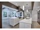 Spacious kitchen with two islands, stainless steel appliances, and hardwood floors at 2883 W Roxboro Ne Rd, Atlanta, GA 30324