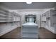 Spacious walk-in closet with ample shelving and hanging space at 2883 W Roxboro Ne Rd, Atlanta, GA 30324