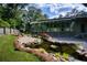 Peaceful pond with waterfall feature at 2883 W Roxboro Ne Rd, Atlanta, GA 30324