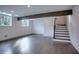 Spacious basement with hardwood floors and exposed beam at 2883 W Roxboro Ne Rd, Atlanta, GA 30324