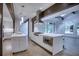 Bright kitchen featuring a large island, stainless steel appliances, and hardwood floors at 2883 W Roxboro Ne Rd, Atlanta, GA 30324