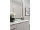 Modern bathroom with a floating vanity, large mirror, and contemporary fixtures at 40 12Th Ne St # 1005, Atlanta, GA 30309