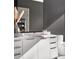 Modern bathroom with a floating vanity, large mirror, and contemporary fixtures at 40 12Th Ne St # 1005, Atlanta, GA 30309