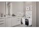Modern bathroom featuring a freestanding soaking tub and sleek vanity at 40 12Th Ne St # 1005, Atlanta, GA 30309