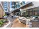 Outdoor patio with seating and grilling area at 40 12Th Ne St # 1005, Atlanta, GA 30309