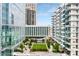 Community features a courtyard with green space and building at 40 12Th Ne St # 1005, Atlanta, GA 30309
