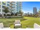 Spacious grassy lawn with seating areas, perfect for relaxing and socializing at 40 12Th Ne St # 1005, Atlanta, GA 30309