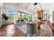 Spacious living area with high ceilings, stone fireplace and access to outdoor space at 29 Riverbirch Ct, Dallas, GA 30157