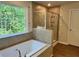 Bathroom with a large walk-in shower and tile flooring at 29 Riverbirch Ct, Dallas, GA 30157