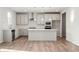 Modern kitchen with white shaker cabinets and island at 29 Riverbirch Ct, Dallas, GA 30157