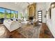 Spacious living room with stone fireplace, large windows, and comfortable seating at 29 Riverbirch Ct, Dallas, GA 30157