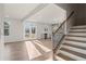 Open living room with hardwood floors and fireplace at 29 Riverbirch Ct, Dallas, GA 30157