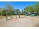 playground with swings and play structures at 29 Riverbirch Ct, Dallas, GA 30157