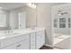 Double vanity bathroom with modern fixtures and flooring at 29 Riverbirch Ct, Dallas, GA 30157