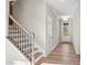 Elegant staircase with black iron spindles at 29 Riverbirch Ct, Dallas, GA 30157