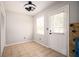 Breakfast room with tile floor, ceiling fan and white door at 3664 Nessa Se Ct, Smyrna, GA 30082