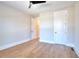 Bright bedroom with hardwood floors and neutral walls at 99 Iroquois Ct, Covington, GA 30014