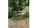 Driveway winding through wooded area at 220 Ridgecrest Se Rd, Mableton, GA 30126