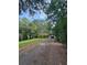 Driveway to house with wooded surroundings at 220 Ridgecrest Se Rd, Mableton, GA 30126