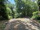 Driveway leading to house through woods at 220 Ridgecrest Se Rd, Mableton, GA 30126