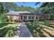 Brick ranch home with long driveway and porch at 45 Latimer Nw Ln, Cartersville, GA 30121