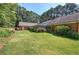 Spacious backyard with green lawn and home view at 45 Latimer Nw Ln, Cartersville, GA 30121
