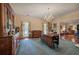 Formal dining room with hardwood floors, antique furniture and blue rug at 45 Latimer Nw Ln, Cartersville, GA 30121