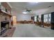 Gathering room with brick fireplace and built-in shelving at 45 Latimer Nw Ln, Cartersville, GA 30121