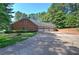 Three-car garage with brick exterior at 45 Latimer Nw Ln, Cartersville, GA 30121