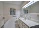 Main bathroom with a bathtub, toilet and double vanity at 45 Latimer Nw Ln, Cartersville, GA 30121