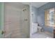 Small bathroom with shower and white vanity at 45 Latimer Nw Ln, Cartersville, GA 30121