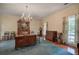 Formal dining room with hardwood floors, antique furniture and blue rug at 45 Latimer Nw Ln, Cartersville, GA 30121