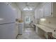 Laundry room with washer, dryer, and built-in workspace at 45 Latimer Nw Ln, Cartersville, GA 30121