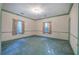 Spacious bedroom with carpet and two windows at 45 Latimer Nw Ln, Cartersville, GA 30121