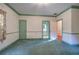 Well-lit bedroom with carpet flooring, and access to bathroom at 45 Latimer Nw Ln, Cartersville, GA 30121