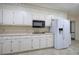 Bright kitchen with white cabinets and double oven at 45 Latimer Nw Ln, Cartersville, GA 30121