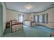 Bedroom with two twin beds and blue carpet at 45 Latimer Nw Ln, Cartersville, GA 30121