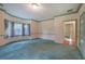 Large bedroom with carpet, bay window, and access to other rooms at 45 Latimer Nw Ln, Cartersville, GA 30121