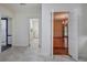 Bright hallway with tile flooring, access to kitchen and dining room at 45 Latimer Nw Ln, Cartersville, GA 30121