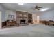 Large Gathering room with a brick fireplace and built-in bookcase at 45 Latimer Nw Ln, Cartersville, GA 30121