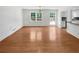Spacious dining room with hardwood floors and access to deck at 3188 Village Glen Dr, Snellville, GA 30039