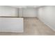 Spacious finished basement with tile flooring at 3188 Village Glen Dr, Snellville, GA 30039